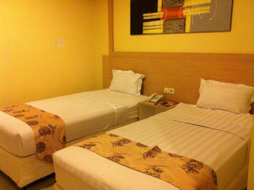 Hotel Paramount Biringkanya Phòng bức ảnh